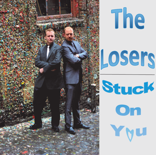 Album Cover of Stuck On You by The Losers, showing two men standing by Seattle's Gum Wall